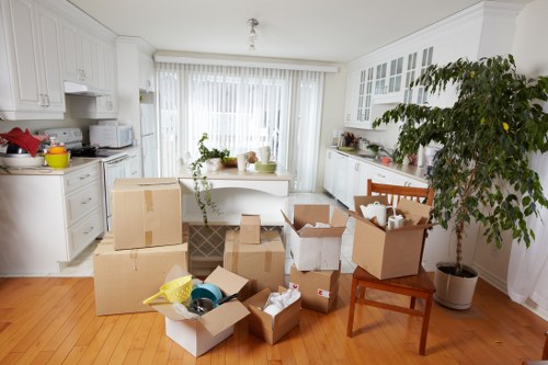 Team handling desks and IT items during an office move
