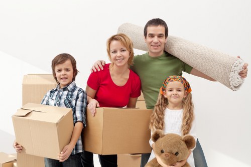 Professional house moving team unloading boxes in Blackheath